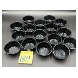 Set of black melamine ramekins.
