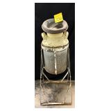 Vintage milk can designed for transporting dair..