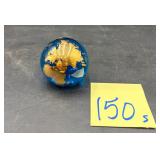 Decorative blue and gold glass earth paperweight