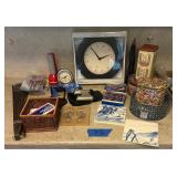 Clock, oriental fan, blue delft Indian sand art