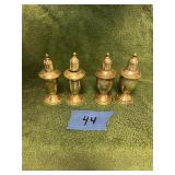 Four Sterling silver shakers