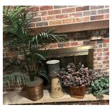 Unique flowerpot on pedestal and plant baskets