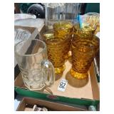 Amber glass cups and mug
