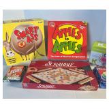 ASSORTED GAMES W/ LARGE WOVEN BASKET