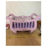 PURPLE ROCKING CRADLE 29' LENGTH, 17' TALL 12'WIDE PURPLE ROCKING CRADLE 29' LENGTH, 17' TALL 12'WIDE