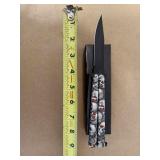 BUTTERFLY KNIFE WITH SKULL DESIGNED HANDLE BUTTERFLY KNIFE WITH SKULL DESIGNED HANDLE
