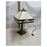Metal table lamp with glass shade. Works