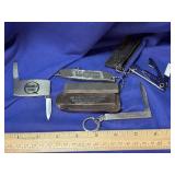 Small pocket knives and whetstone