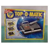 Top-O-Matic cigarette machine