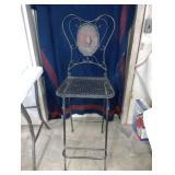 Antique black iron barstool