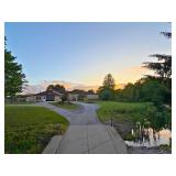 Separate driveway, loop drive, to outbuildings