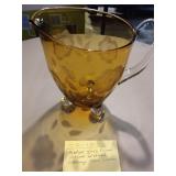 Amber Glass footed pitcher w/etched Cabbage Rose