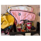 Lot of dog clothes, treats, food, etc