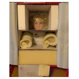 Got milk? Porcelain doll by Marie Osmond