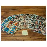 Stack of Topps baseball cards in sleeve pages