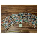 Stack of Topps baseball cards sleeve pages