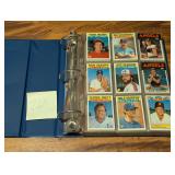 Binder of Topps baseball cards