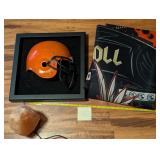 Football helmet plaque, rock & roll rug, salt lamp