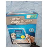 Waterpik NIB & Two Irons
