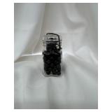 Black Game Marbles in Jar