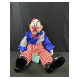 A Dynasty Doll Porcelain Sitting Clown 14'