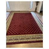 Machine woven wine tone rug 127x88"