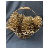Basket with pinecones painted gold