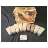 Gold Lancome Paris Vanity bag w/ assorted lotions