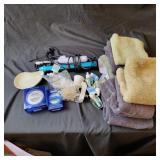 Assortment of towels, Curling irons, and Air