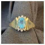 10k YG Oval Lt Blue Gemstone ring with Diamond