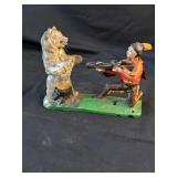 Cast Iron Piggy Bank Native American Shooting Bear