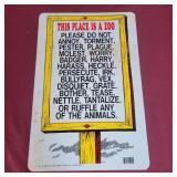"This place is a Zoo" plastic sign 11x17