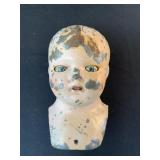 Metal doll head