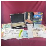 Briefcase full of Emphera- Manuals, Auction