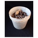 Bucket Full of Chains and Hooks