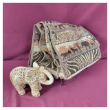 Animal Print Rolling Bag and Elephant Decor