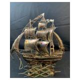 Vintage metal musical rocking sail ship .