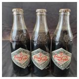 3 Full Coca-Cola Bottles 1976