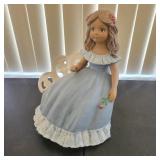 Ceramic Southern Belle sitting on Bench