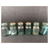 6 mason jars all with glass flip top lids