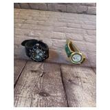 2 Watches- 1 Black No Brand - 1 Geneva Quartz