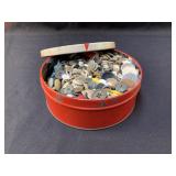 Tin full of buttons