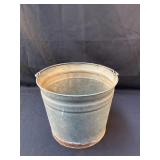 Metal Pail with holes in the bottom