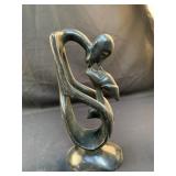 Dark Wood Carved Man and Woman Kissing