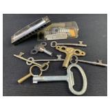 Group of misc items including harmonica, skeleton