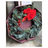 Wreath with pinecones red ribbon 26 inches