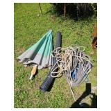 Umbrella, plastic pipe, assorted rope