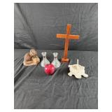 Otter figurine, turtle sun dial, wooden cross,