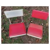 Vintage red and white stadium seats. Has some
