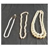 Faux pearl necklaces